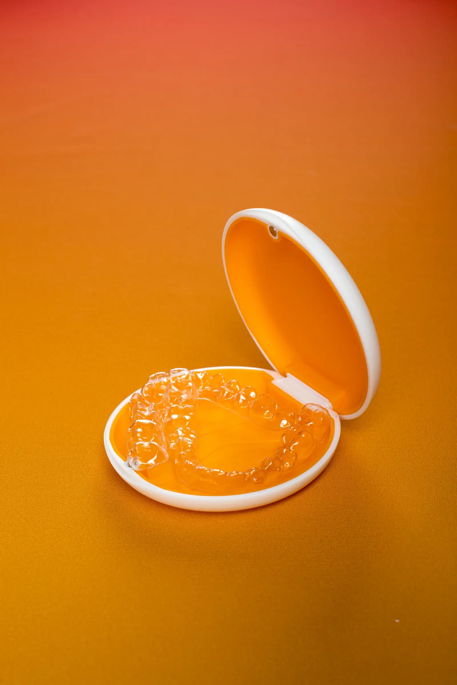 An open Mia Aligners case with trays