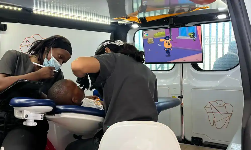 Learner at a pre-booked on-campus dental appointment between class bells